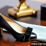 여성용 하이힐 관리법 - A detailed close-up of a pair of high-heeled shoes made of polished leather being gently cleaned wit...